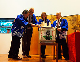 breaking open a ceremonial sake barrel